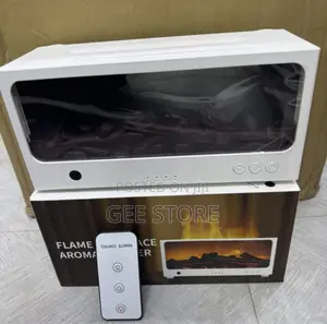 White Flame Fireplace Aroma Diffuser With Its Box and Remote Control
