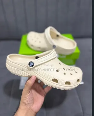 Cream Crocs Clogs