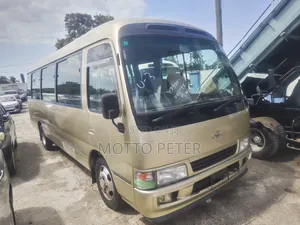 Toyota Coaster 2003 Gold