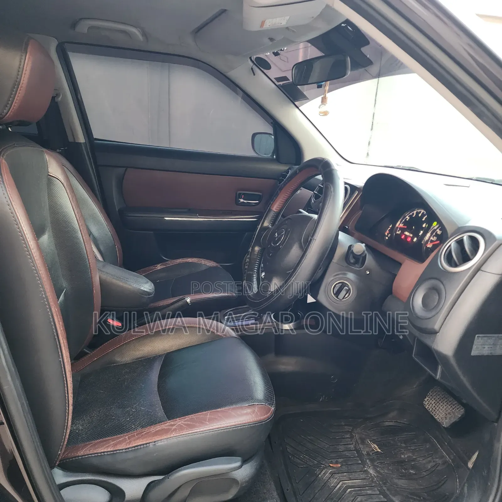 Mazda Verisa 2009 Brown