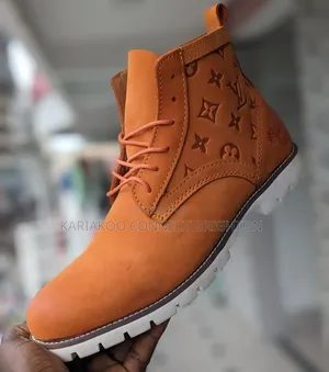 Brown Monogram Boots