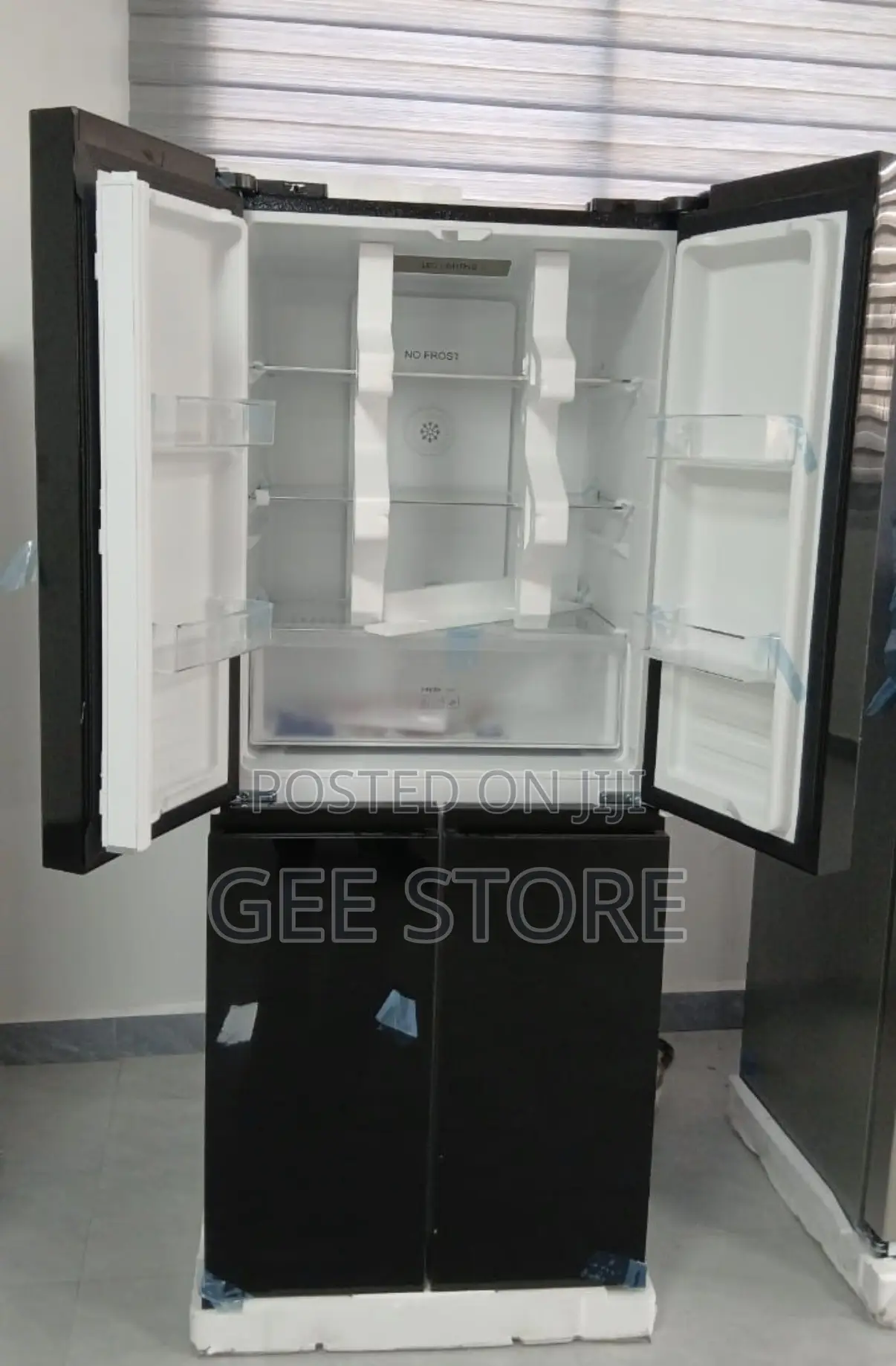 An ADH 558-Liter 4-Door "No Frost" Refrigerator