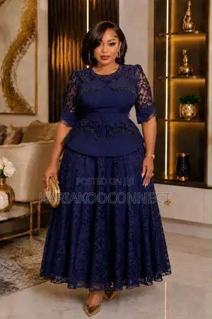 Elegant Lace Peplum Gown