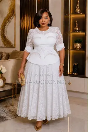 Elegant Lace Peplum Gown