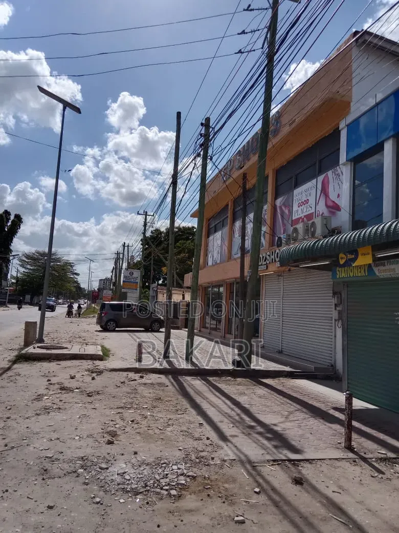 NYUMBA INAUZWA YENYE MADUKA 12 for Sale in Kinondoni Road