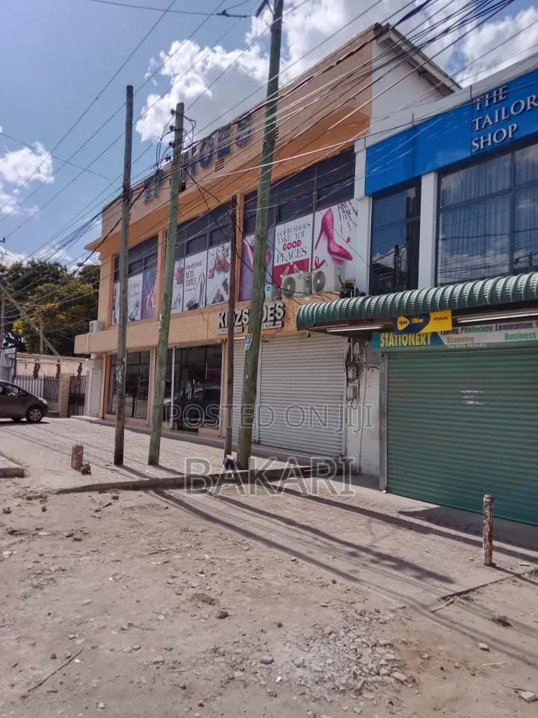 NYUMBA INAUZWA YENYE MADUKA 12 for Sale in Kinondoni Road