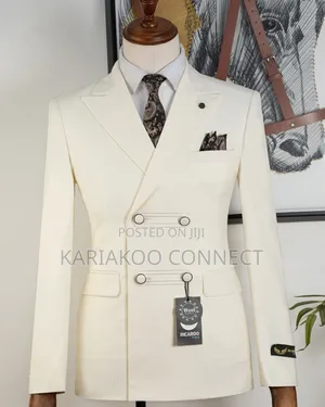 The Tailored Look Cream Suit