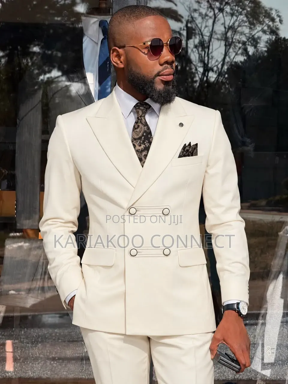 The Tailored Look Cream Suit