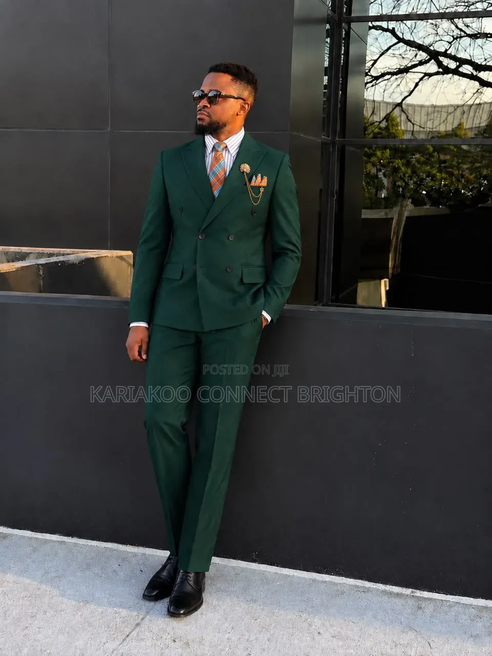 Dark Green Double-Breasted Suit With Plaid Tie