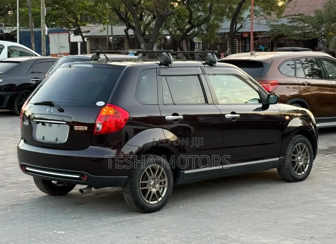 Mazda Verisa 2009 Maroon