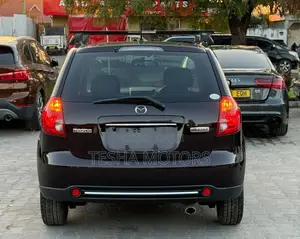Mazda Verisa 2009 Maroon