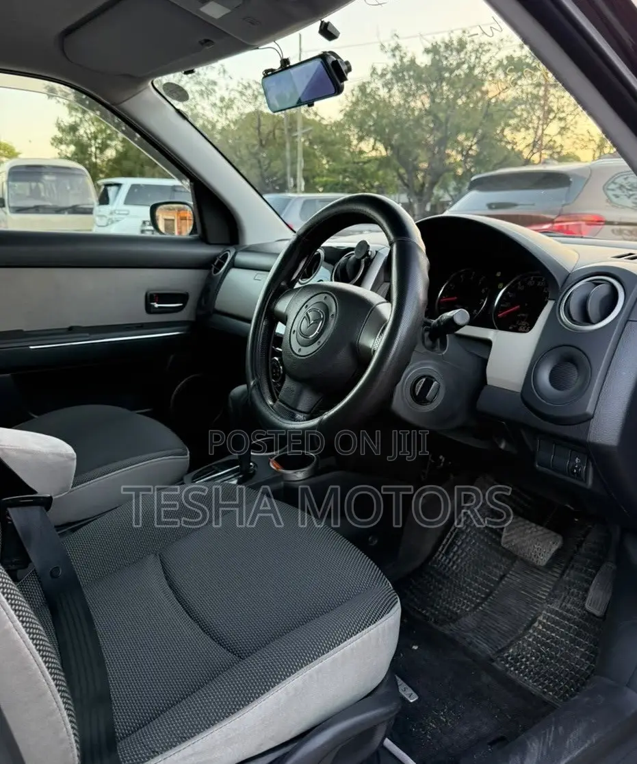 Mazda Verisa 2009 Maroon