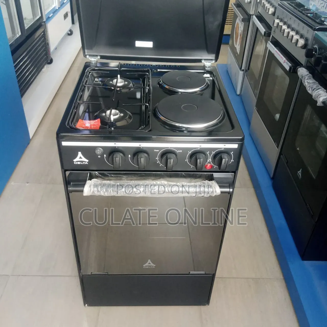 4 Plates Delta Gas and Electric Stove With Oven