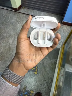 Poly Voyager Free 60+ UC Touchscreen Smart Case Earbuds