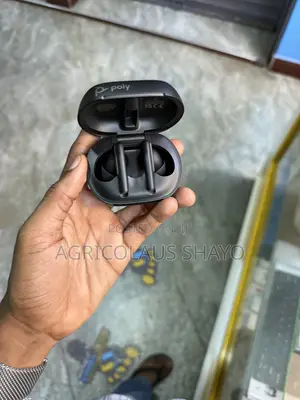 Poly Voyager Free 60+ UC Touchscreen Smart Case Earbuds