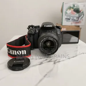 Canon 700D Na Lens Ya 18-55mm, Mkanda Na Chaja Yake.