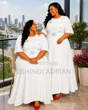 ELEGANT LONG DRESSPrice: 80,000/=Size: 46–58Colour: Only White