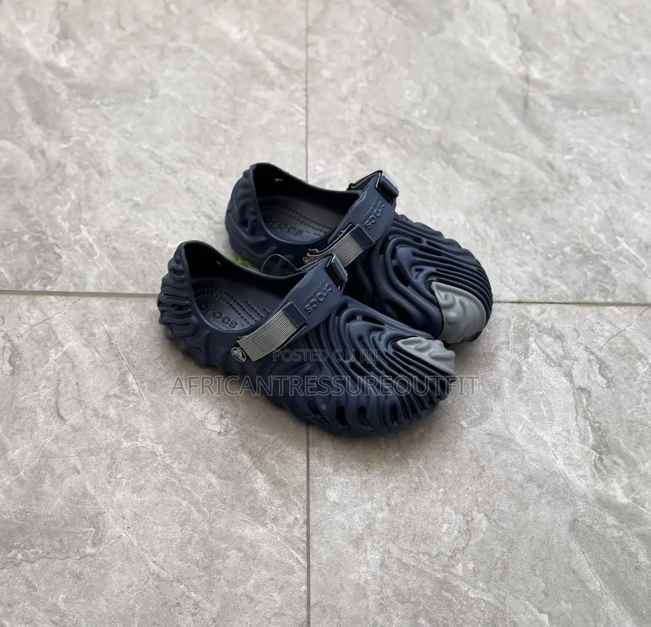 Crocs Pollex Clog Featuring a Distinctive Fingerprint and Adjstable