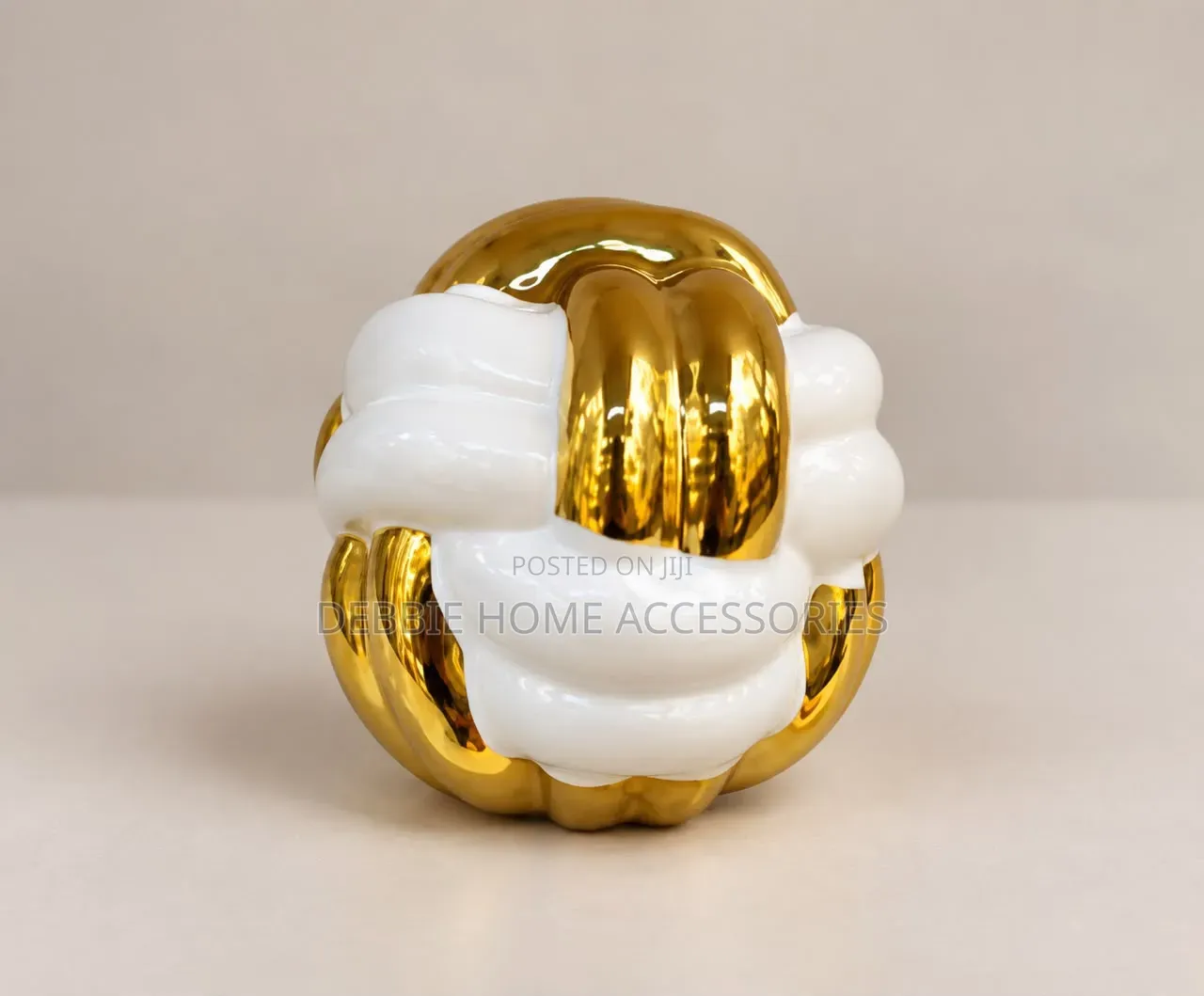 Ceramic Knot Decorative Sculpture in White With Gold Sections.
