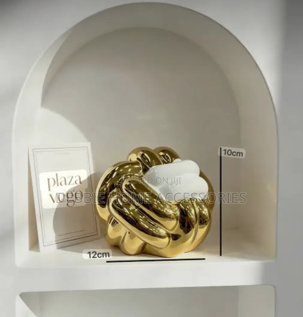 Ceramic Knot Decorative Sculpture in White With Gold Sections.