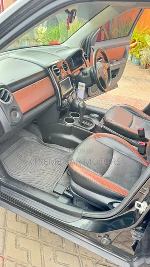 Mazda Verisa 2009 Maroon