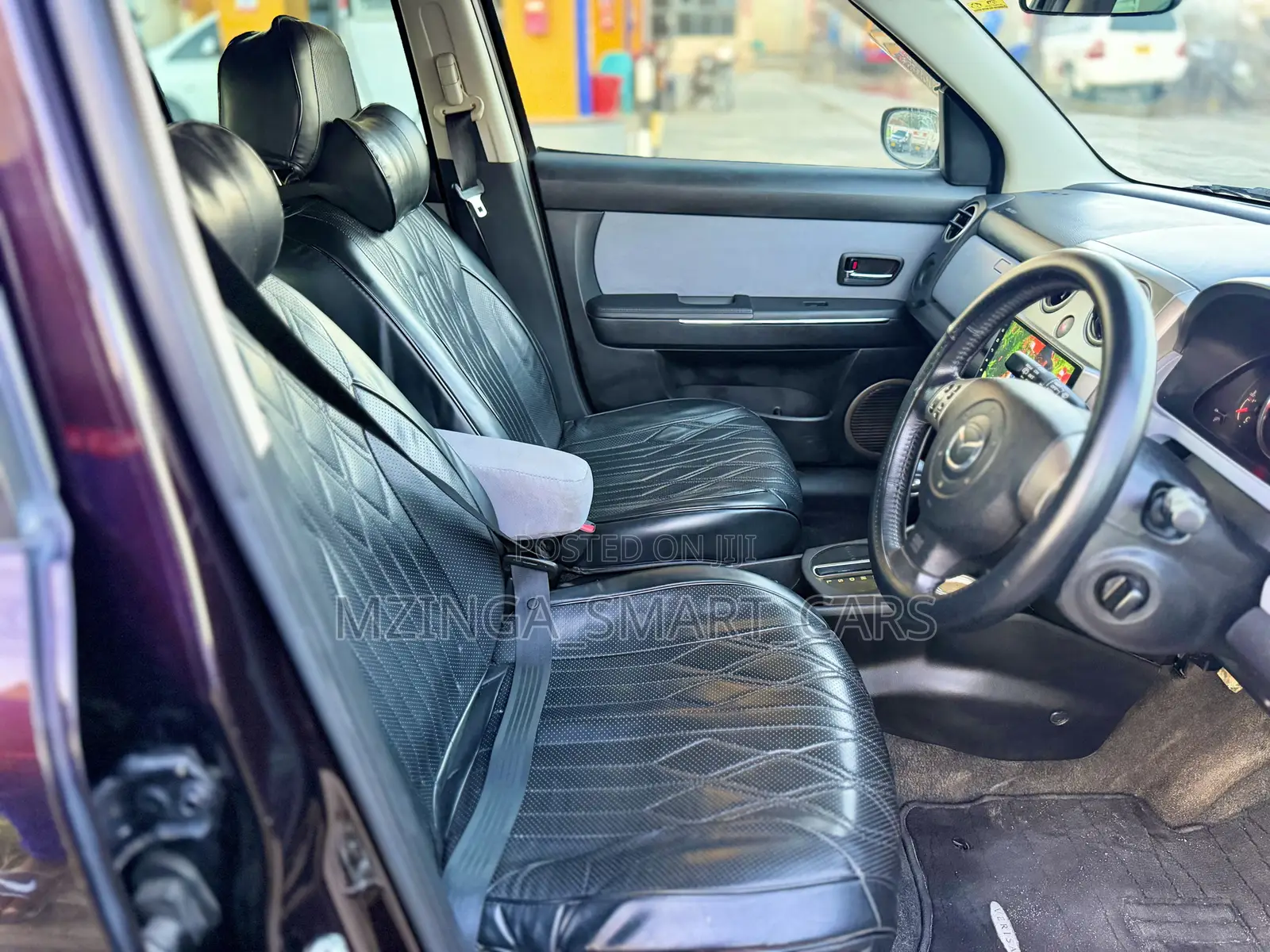 Mazda Verisa 2010 Maroon