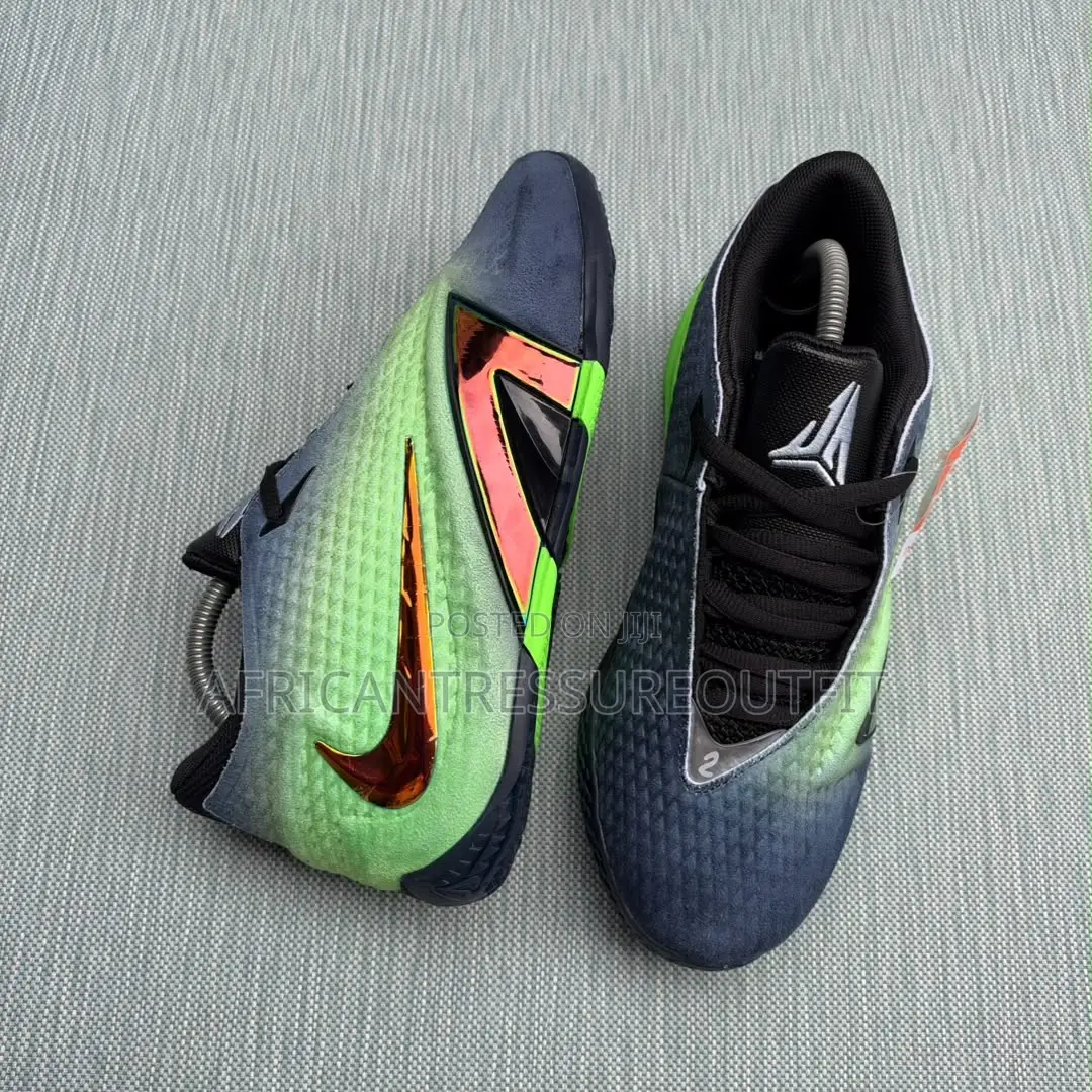 Nike Ja 4 Nigthmare Basketball Shoes Featuring a Mettalic Swoosh