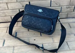 This Bag Is the Coach Sullivan Flap Crossbody Bag in Signature Canvas