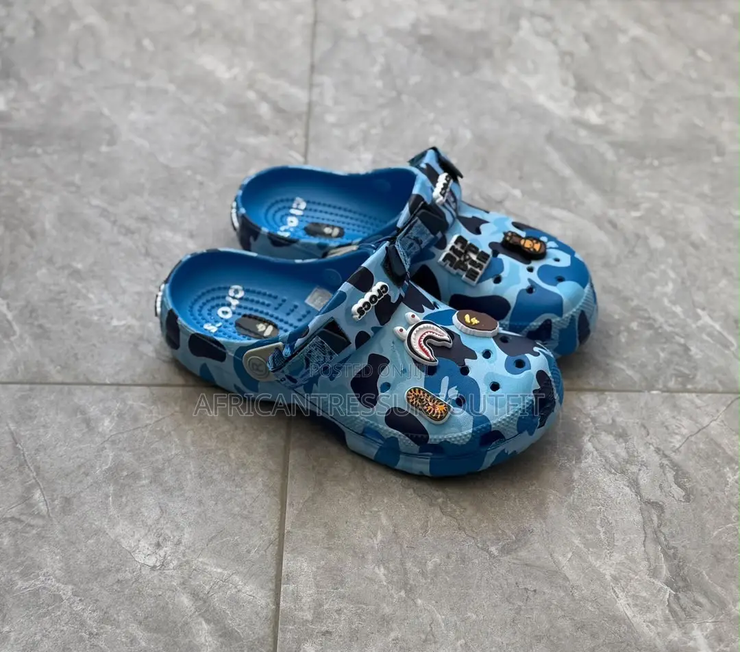 A Bathing Ape X Crocs Classic Clogs Feature Camouflage Print |Shop Now