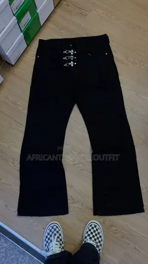 Blue and Black Demin Jeans Featuring Distinctive Hook and Eye Closure