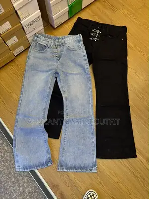 Blue and Black Demin Jeans Featuring Distinctive Hook and Eye Closure