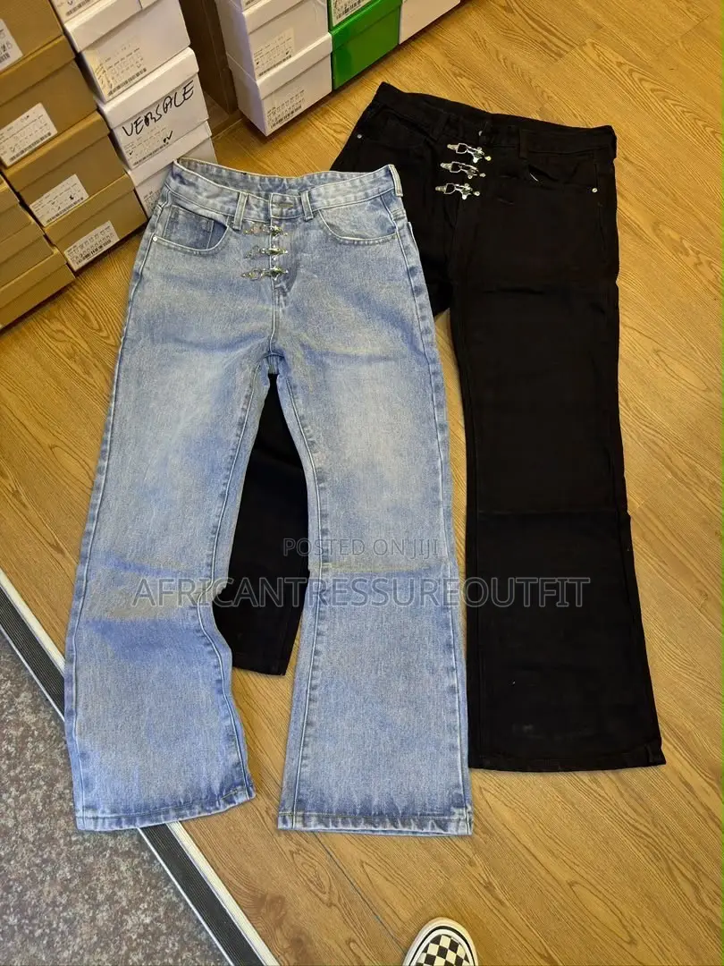 Blue and Black Demin Jeans Featuring Distinctive Hook and Eye Closure