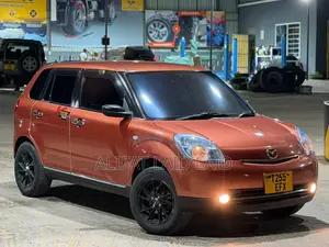 Mazda Verisa 2010 Red