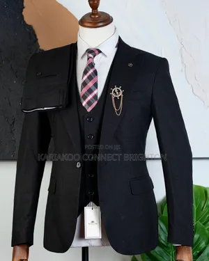 Classic Black Three-Piece Suit With Plaid Tie