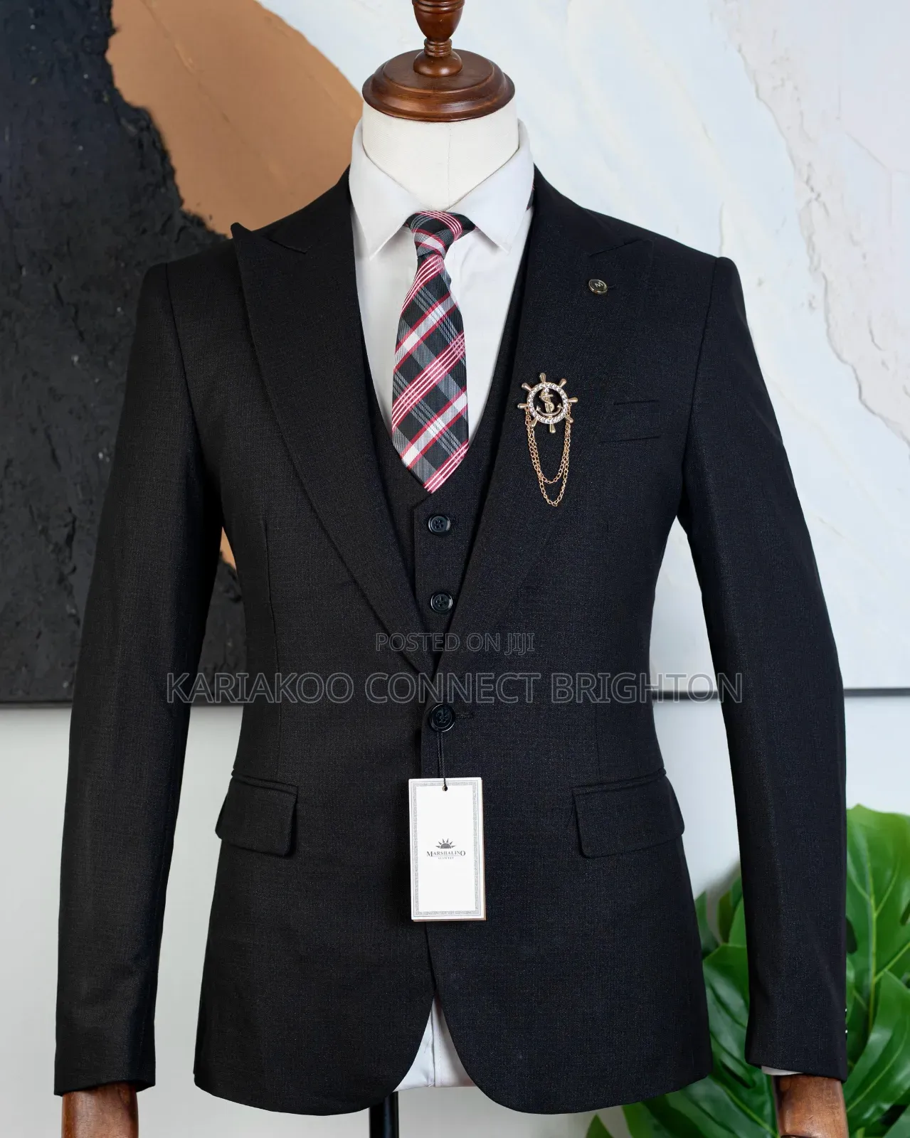 Classic Black Three-Piece Suit With Plaid Tie