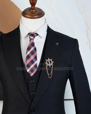Classic Black Three-Piece Suit With Plaid Tie