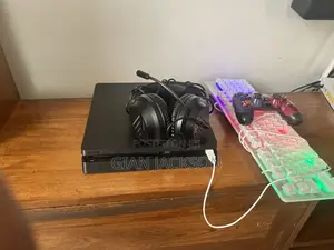 PlayStation 4 With Keyboard and Headphones
