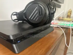 PlayStation 4 With Keyboard and Headphones