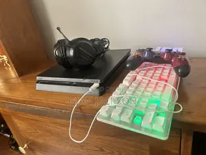 PlayStation 4 With Keyboard and Headphones