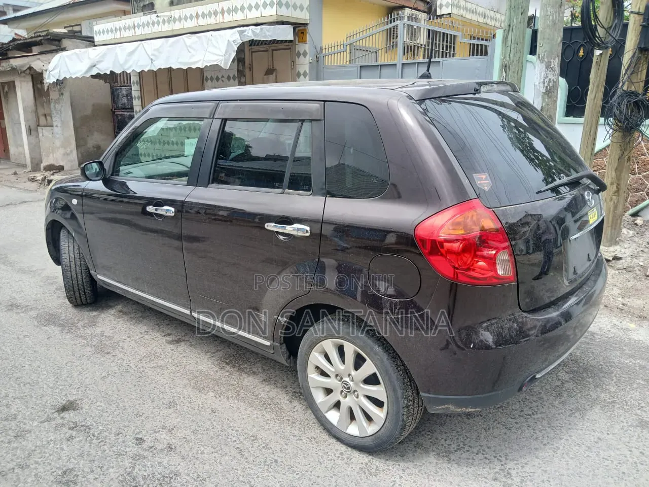 Mazda Verisa 2014 Maroon