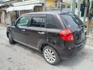 Mazda Verisa 2014 Maroon
