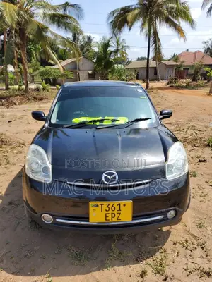 Mazda Verisa 2009 Burgundy