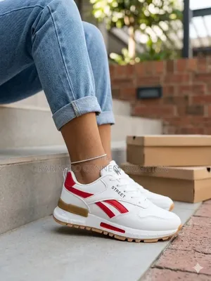 White & Red Accent Sneakers With Street Branding