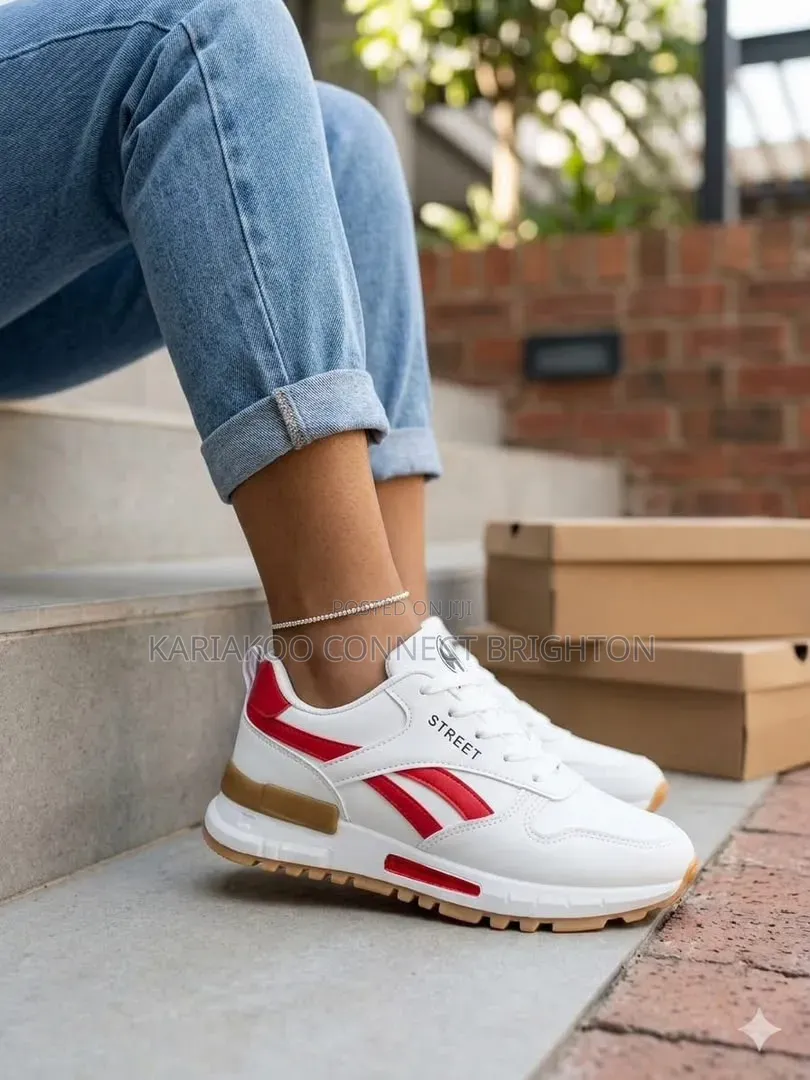 White & Red Accent Sneakers With Street Branding