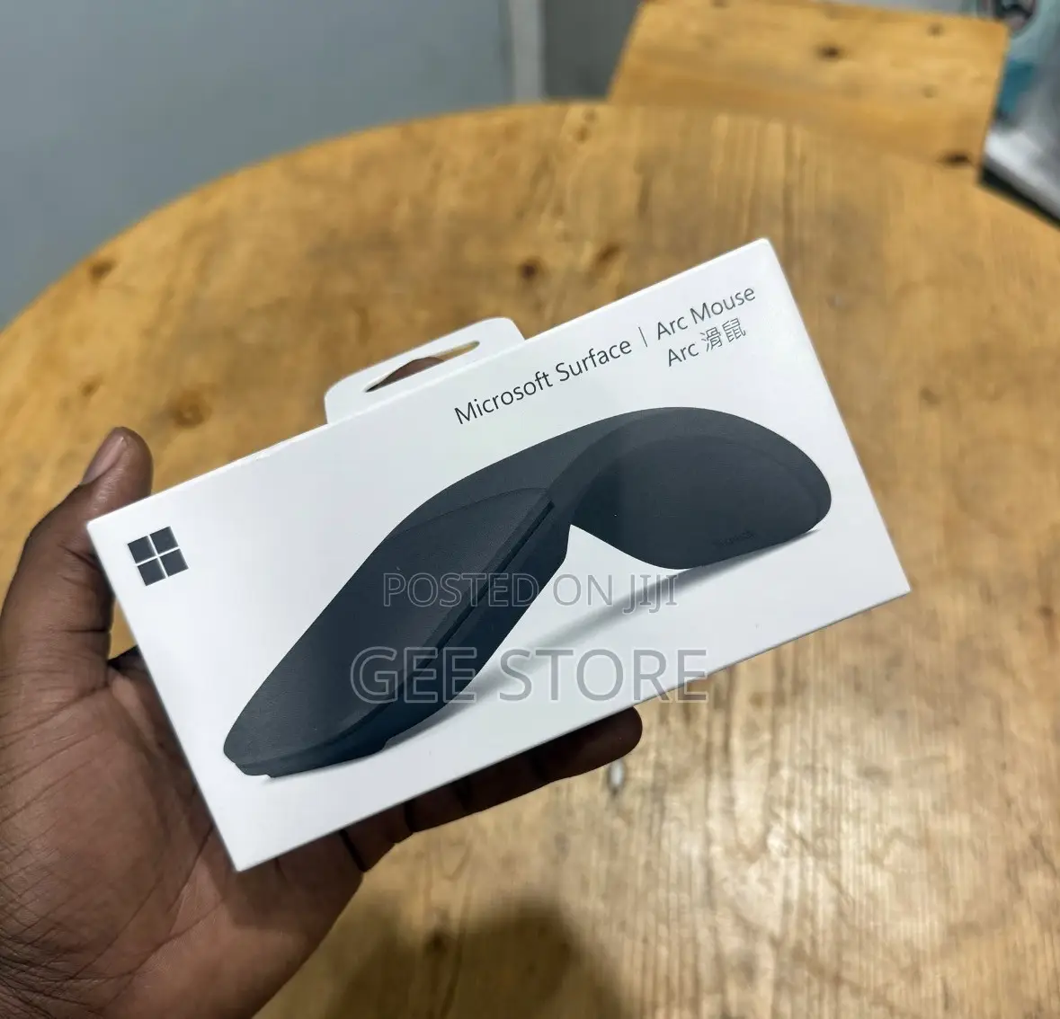 A Microsoft Surface Arc Mouse in Black.
