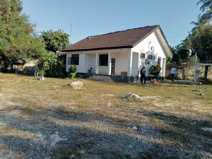 A 2500sqm Fenced Plot With House for Rent