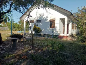 A 2500sqm Fenced Plot With House for Rent