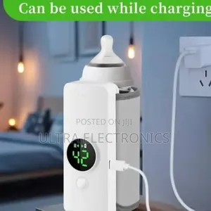 Portable Baby Milk Bottle Warmer With a Digital Temperature Display.