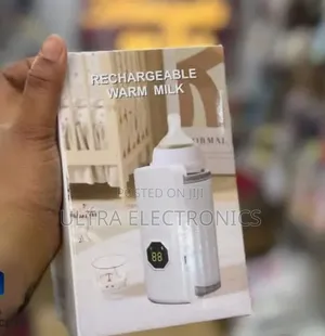 Portable Baby Milk Bottle Warmer With a Digital Temperature Display.