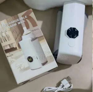Portable Baby Milk Bottle Warmer With a Digital Temperature Display.